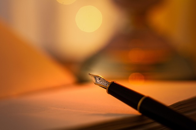 Person proofreading handwritten notes at a writing desk with a pen