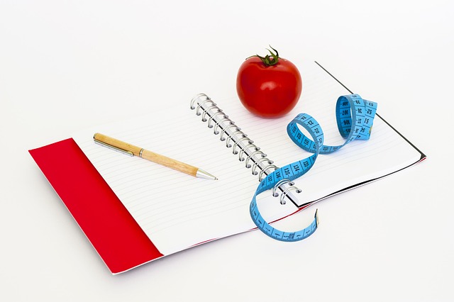 Handwritten notebook page with cursive writing practice