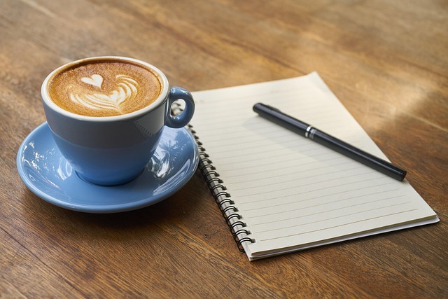Notebook with handwritten English words and corrections