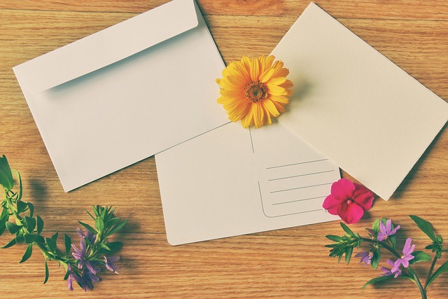 Handwritten correspondence with envelope on writing desk